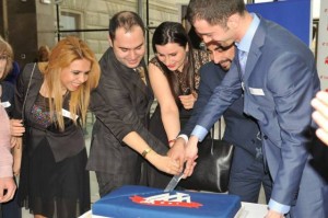 The AAA board cutting the cake