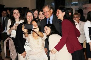 FLEX Alumnae taking self shot with the Ambassador Norland