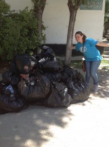 Munira Mirmamadova '09 with the 250 kg trash