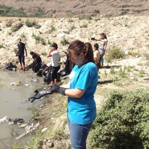 Munira Mirmamadova'09 is cleaning the river side