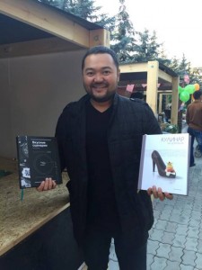 Sanzhar at a book presentation of his friend, a famous Almaty chef Kira Maysheva